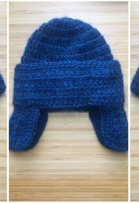 Three overhead photos lay side by side of a blue crochet baby hat with ear flaps resting on a light wooden background. The hat is seen from the laying on its left side, folded in the middle and then from the right side across the photo to show of the fancy ear flaps.